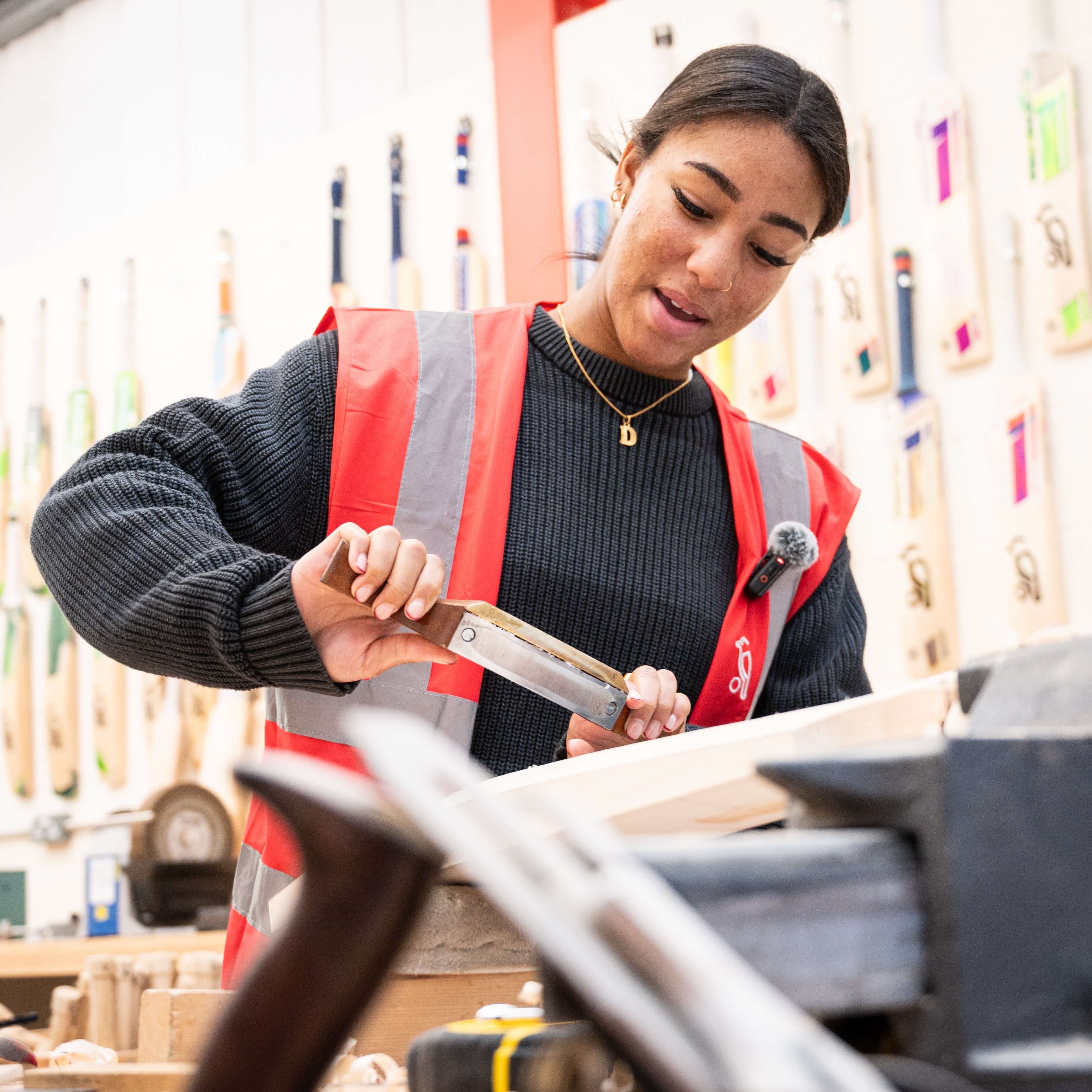 Davina Perrin has a go at bat making in the Kookaburra Bat Cave
