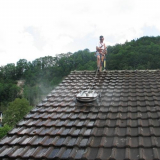Mosmatic Roof Cleaner Application on steep roof