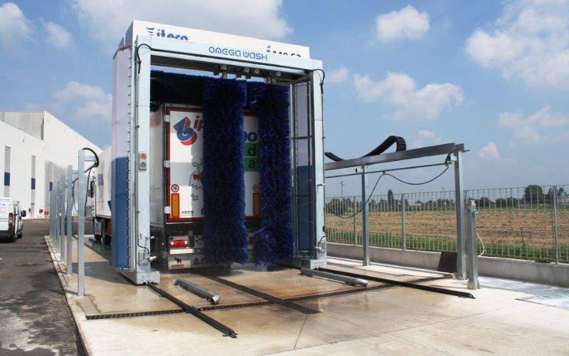 Iteco Omega wash drive through truck washing system with rollover brush
