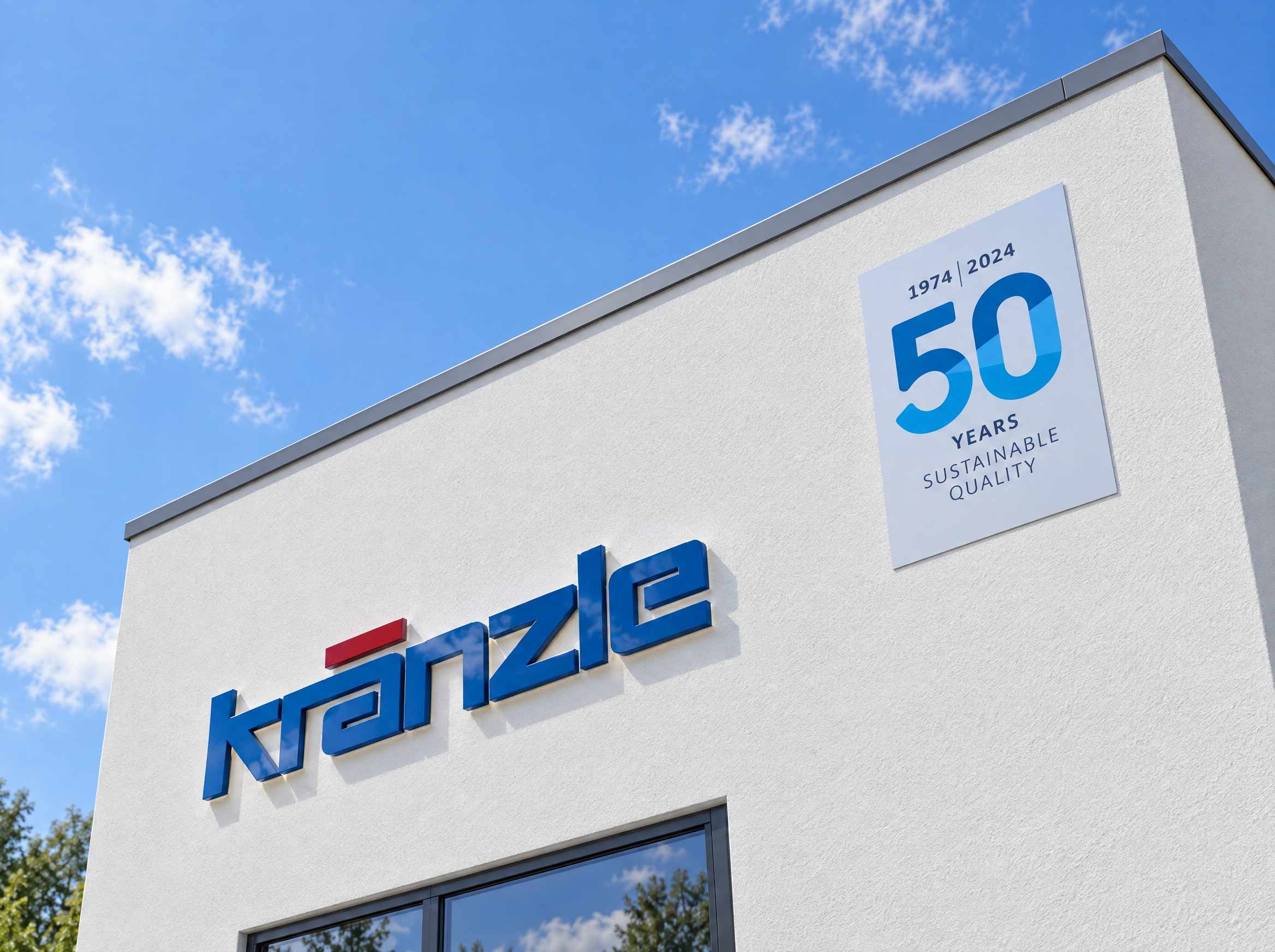 Kränzle signage and 50-year sustainable quality emblem on a building