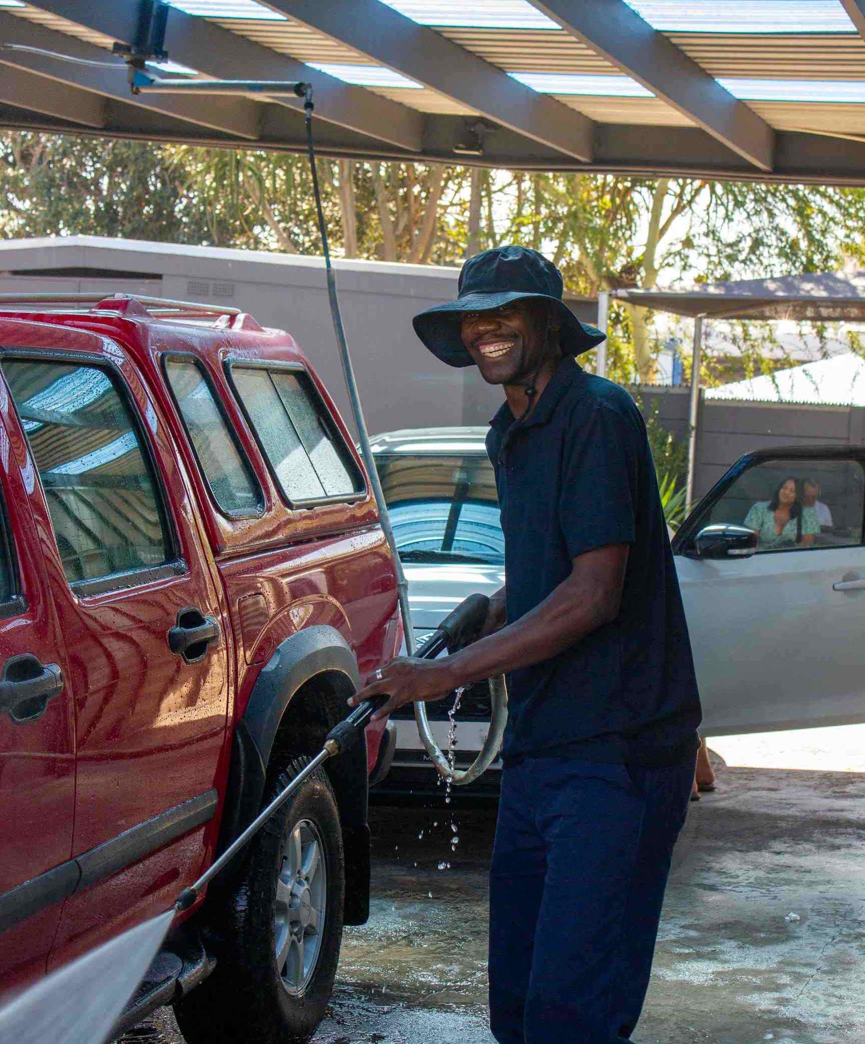 Car Wash operator using a Kranzle Pressure Washer