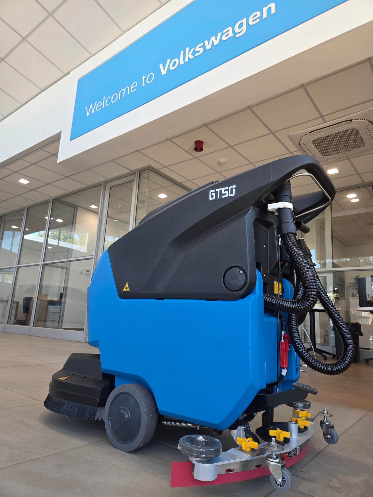 Gadlee GT50 Plus scrubber dryer, brush deck and squeegee, at a vehicle dealership